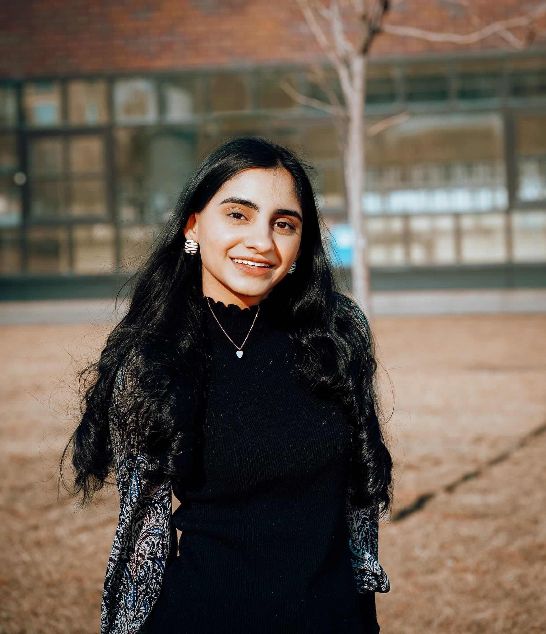 Muskan Dillon, a CU CHANGE chapter leader, smiles on a campus plaza.